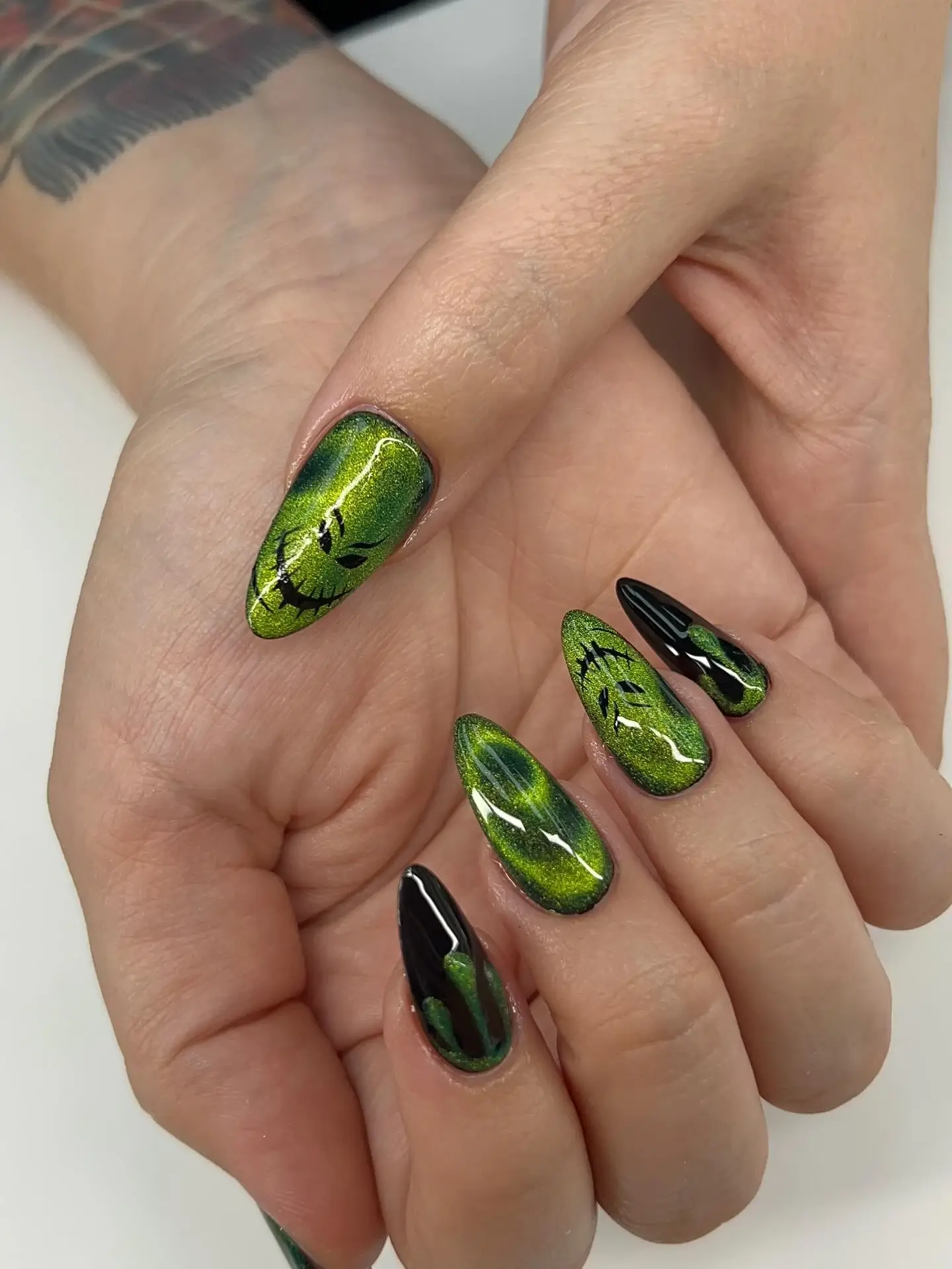Chrome green nail art at A-List Nails Orlando FL