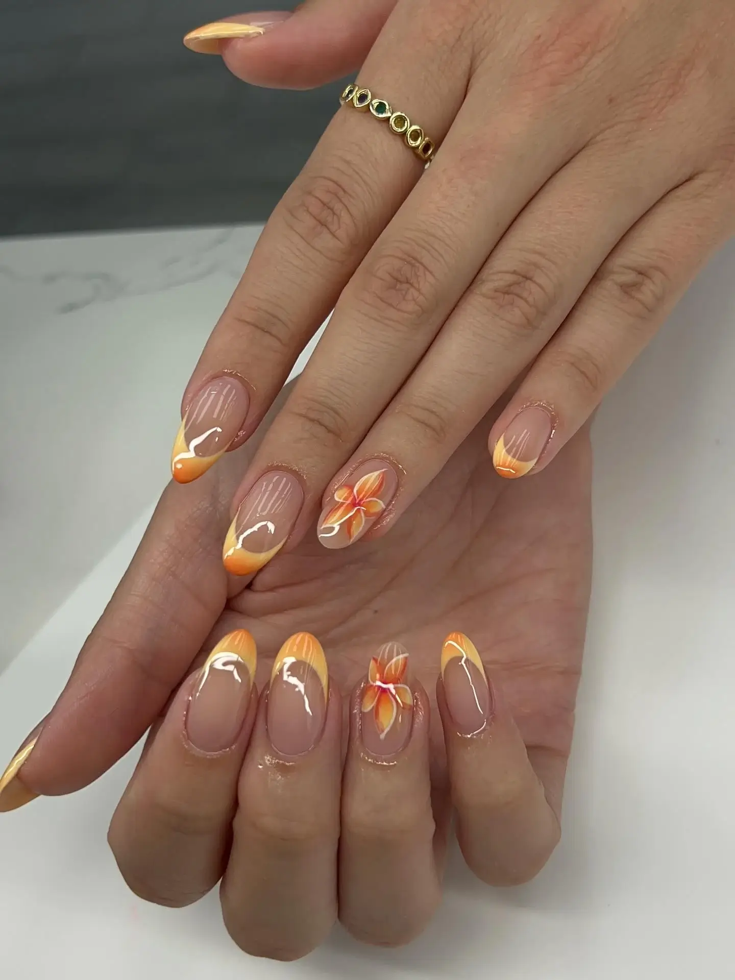 Orange floral nail art at A-List Nails Orlando FL