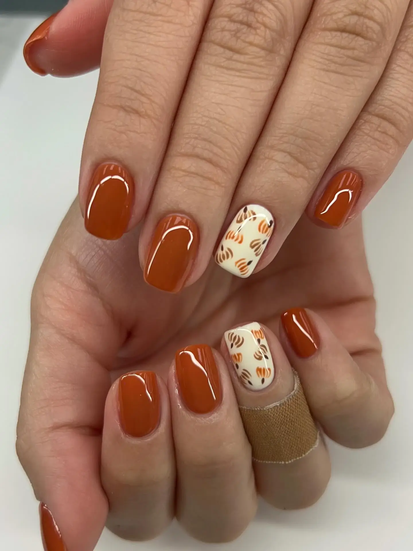 Orange rust nail art at A-List Nails Orlando FL